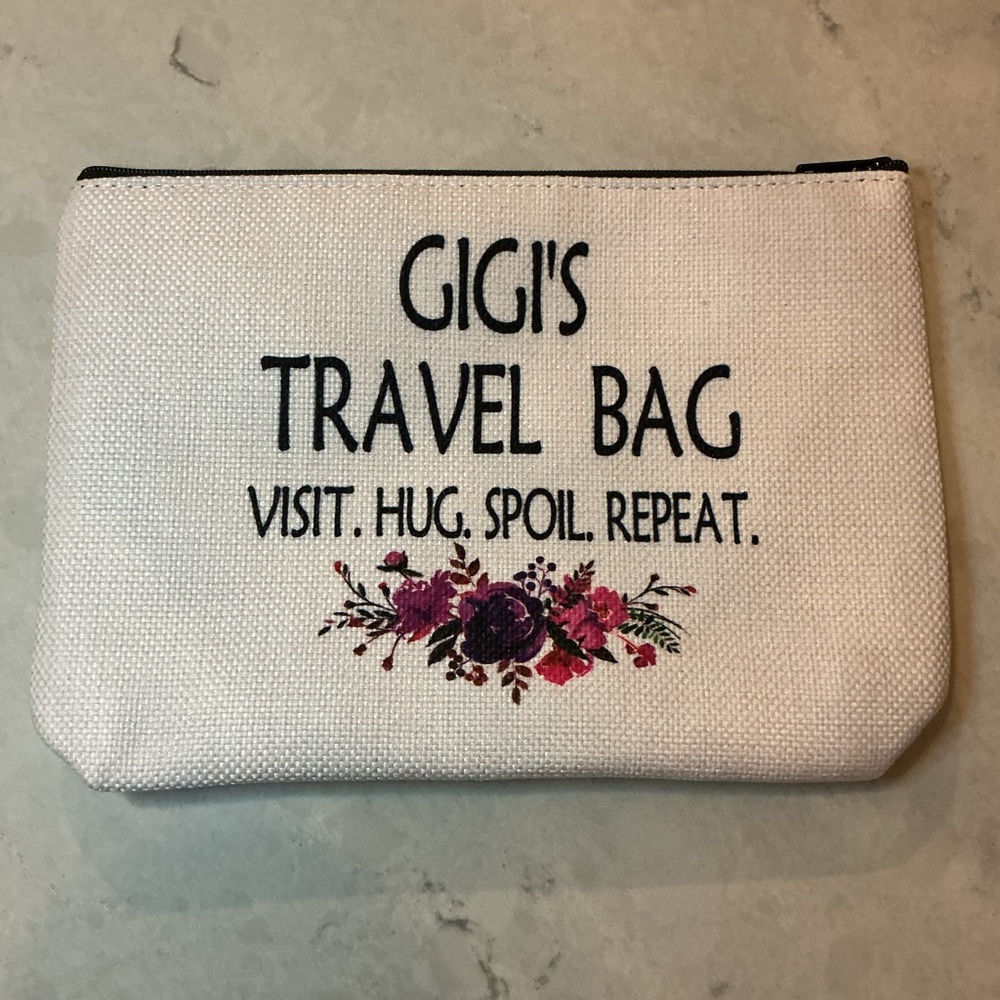 GIGI’s Cream Travel Bag with Floral Design 9” x 2” x 7”. NIB